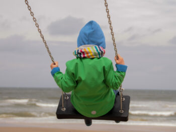 child swinging for emotional self-regulation